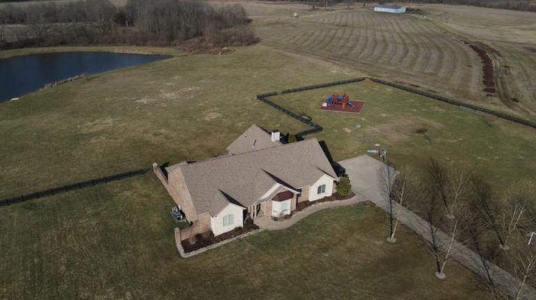 Ridgepoint field lead inspecting a roof in Central Kentucky